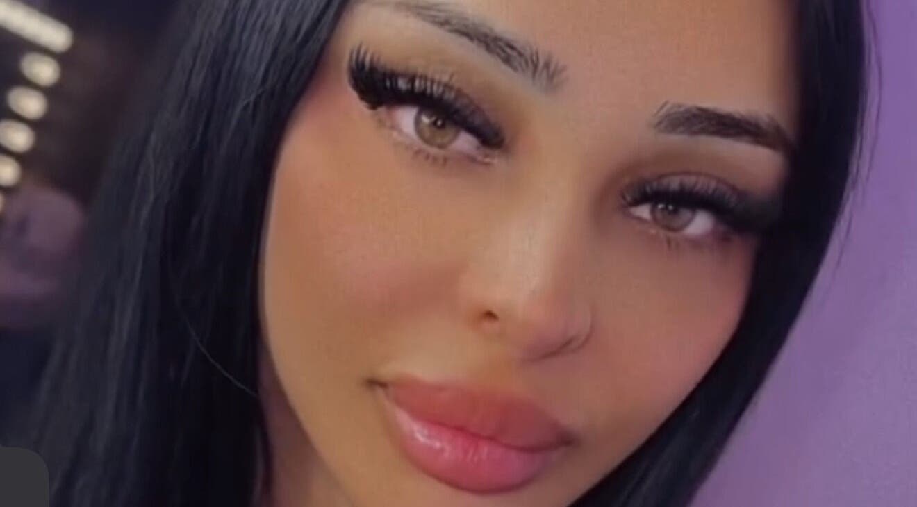 Close-up of a woman's face with stunning lashes at Flamelash, Toronto, Ontario, CA.