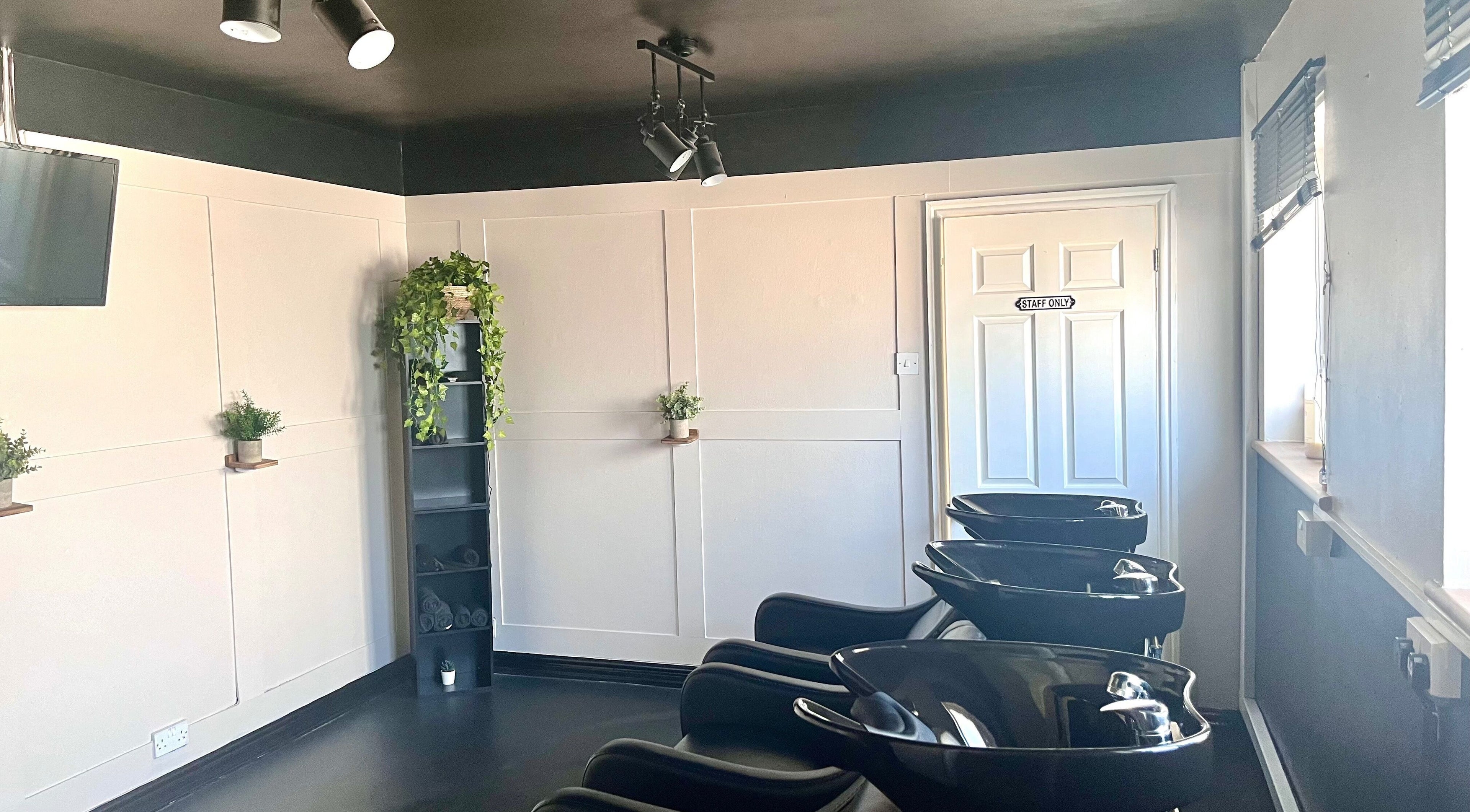 Elegant salon wash stations at Ballantynes Hair and Beauty, Stourport-on-Severn, England, GB with modern decor.