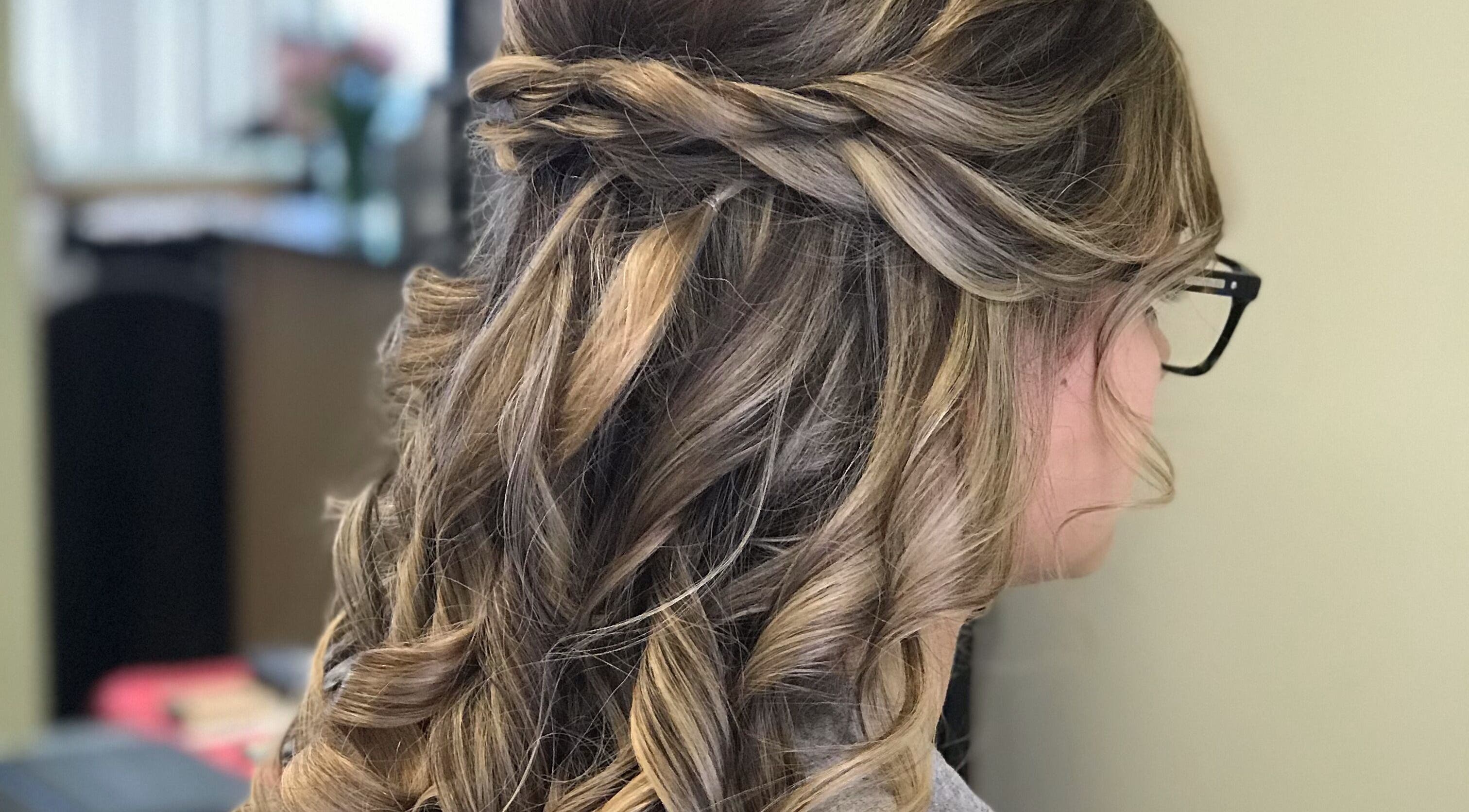 Elegant braided hairstyle crafted at Salon Cecy and Color Studio, Bolingbrook, Illinois, US.