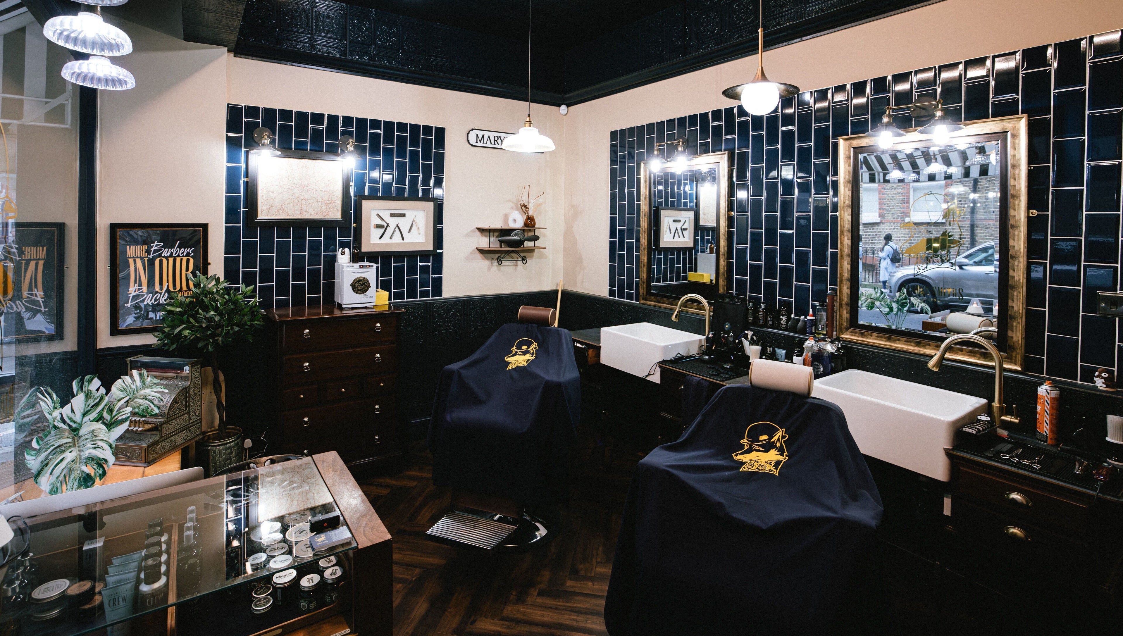 Elegant interior of Barber Smiths Marylebone in London, England, GB featuring vintage decor and grooming stations.