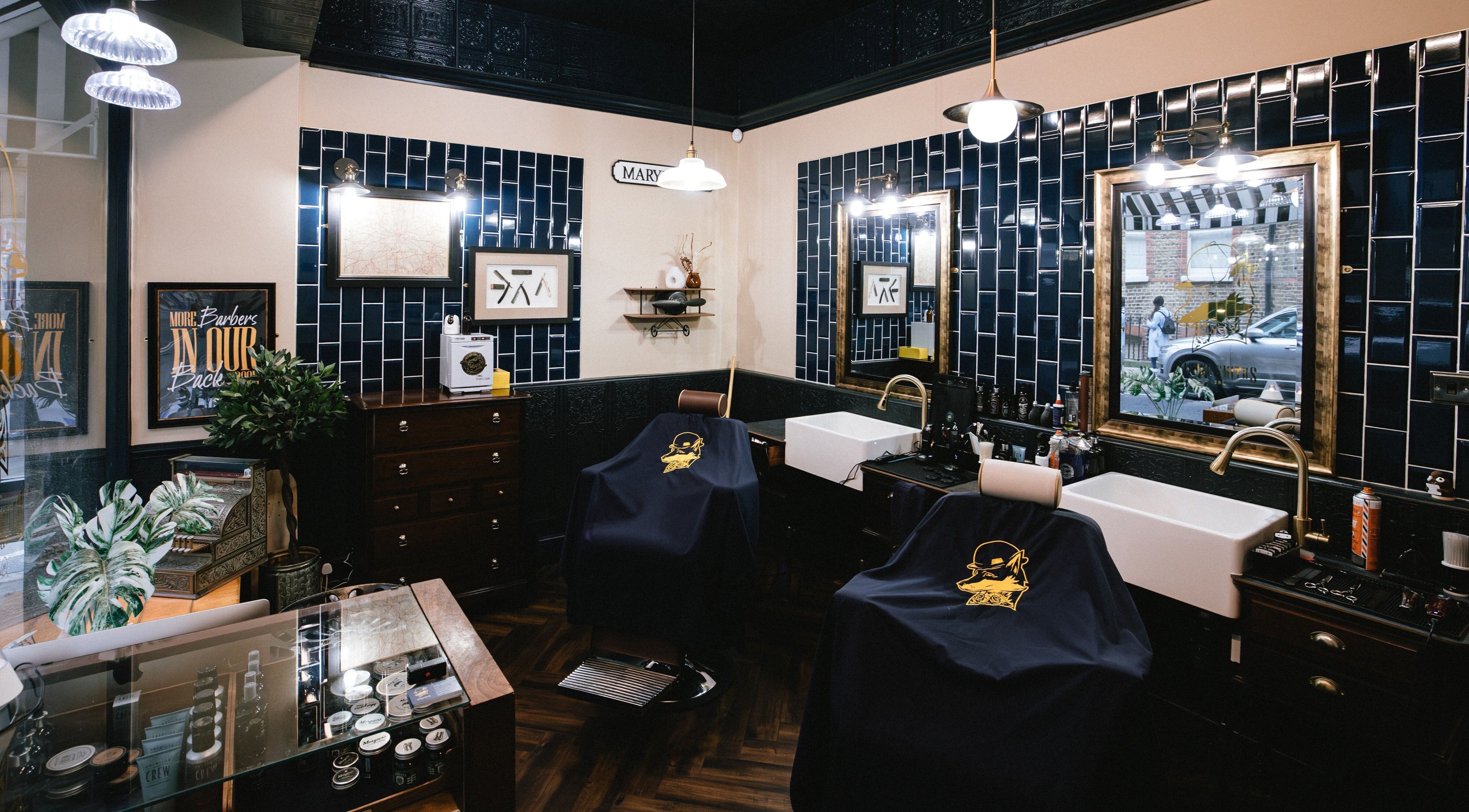 Elegant interior of Barber Smiths Marylebone in London, England, GB featuring vintage decor and grooming stations.