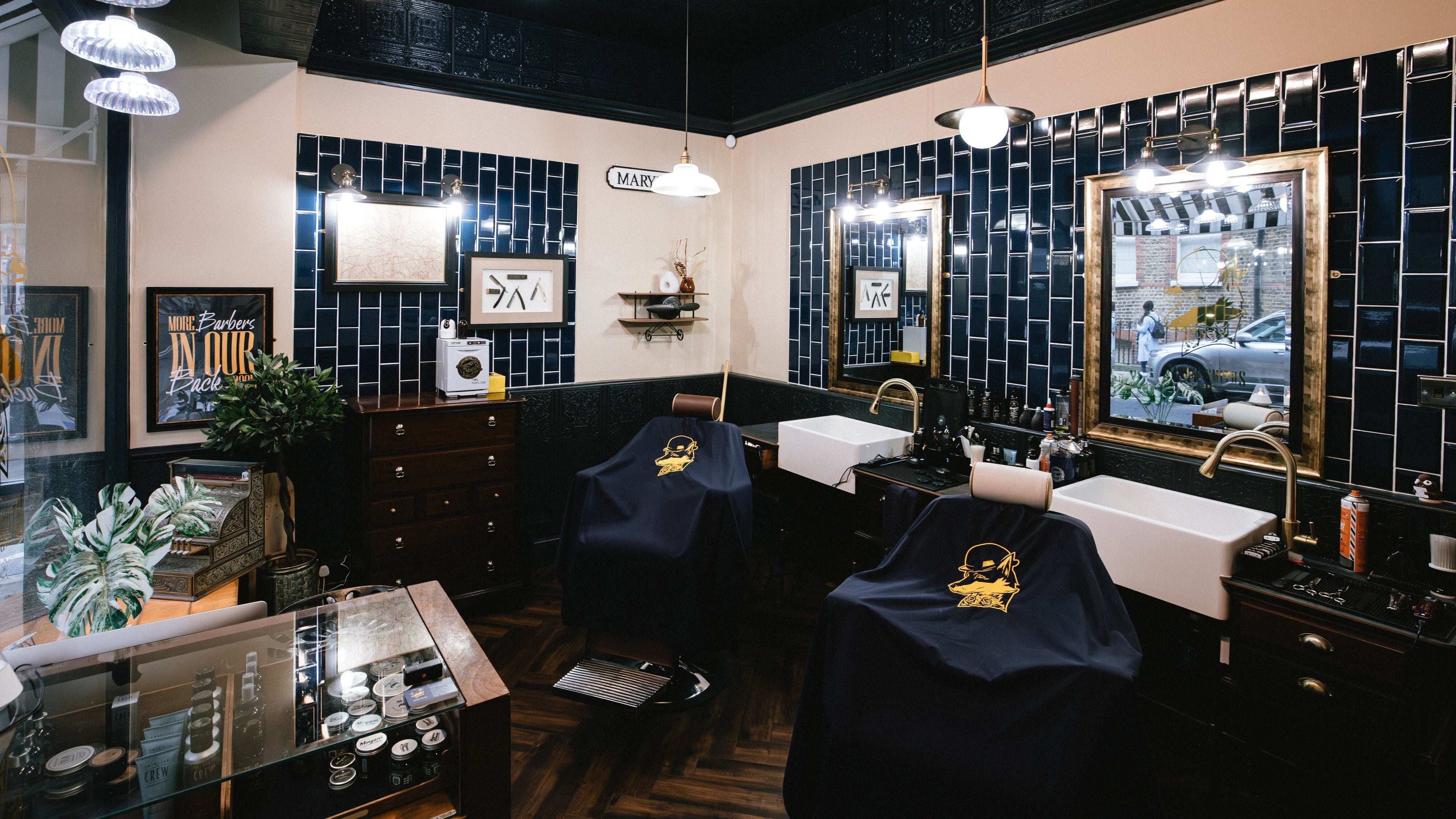 Elegant interior of Barber Smiths Marylebone in London, England, GB featuring vintage decor and grooming stations.
