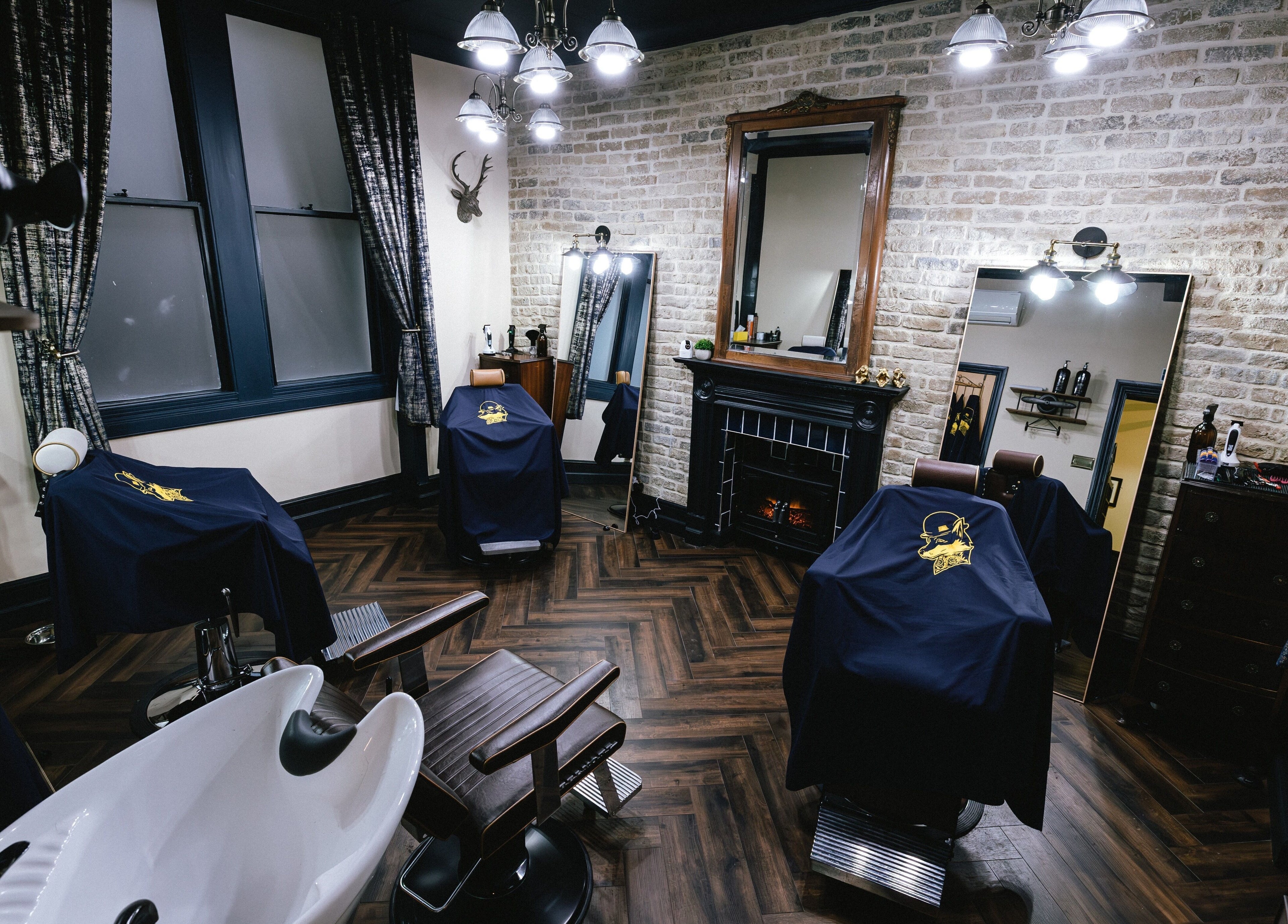 Chic interior of Barber Smiths Marylebone, London, England, GB showcasing stylish chairs and decor.