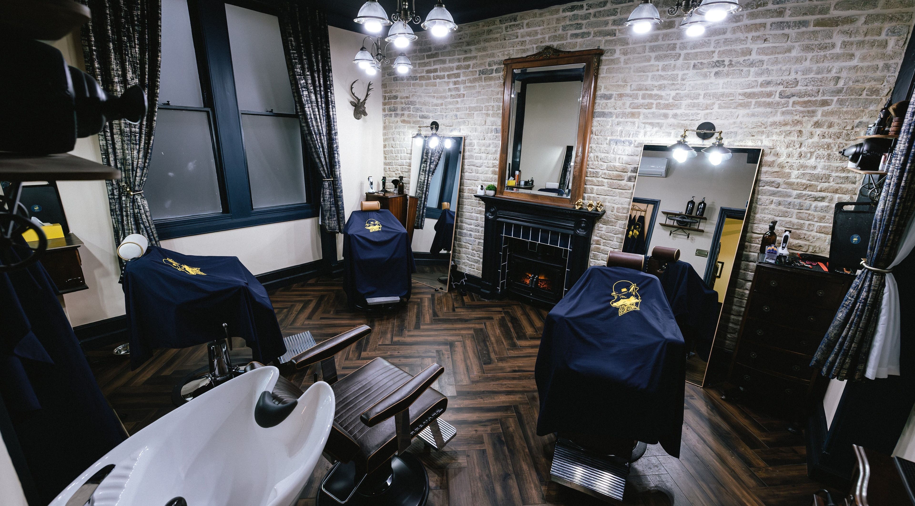 Chic interior of Barber Smiths Marylebone, London, England, GB showcasing stylish chairs and decor.