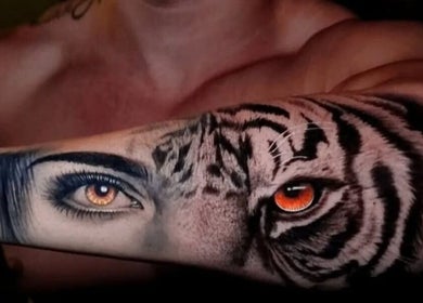 Intricate half-tiger tattoo design at BarberSmiths Tattoo Studio, London, England, GB.