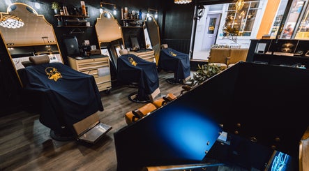 Modern interior of BarberSmiths Islington in London, England, GB with stylish barber chairs and mirrors.