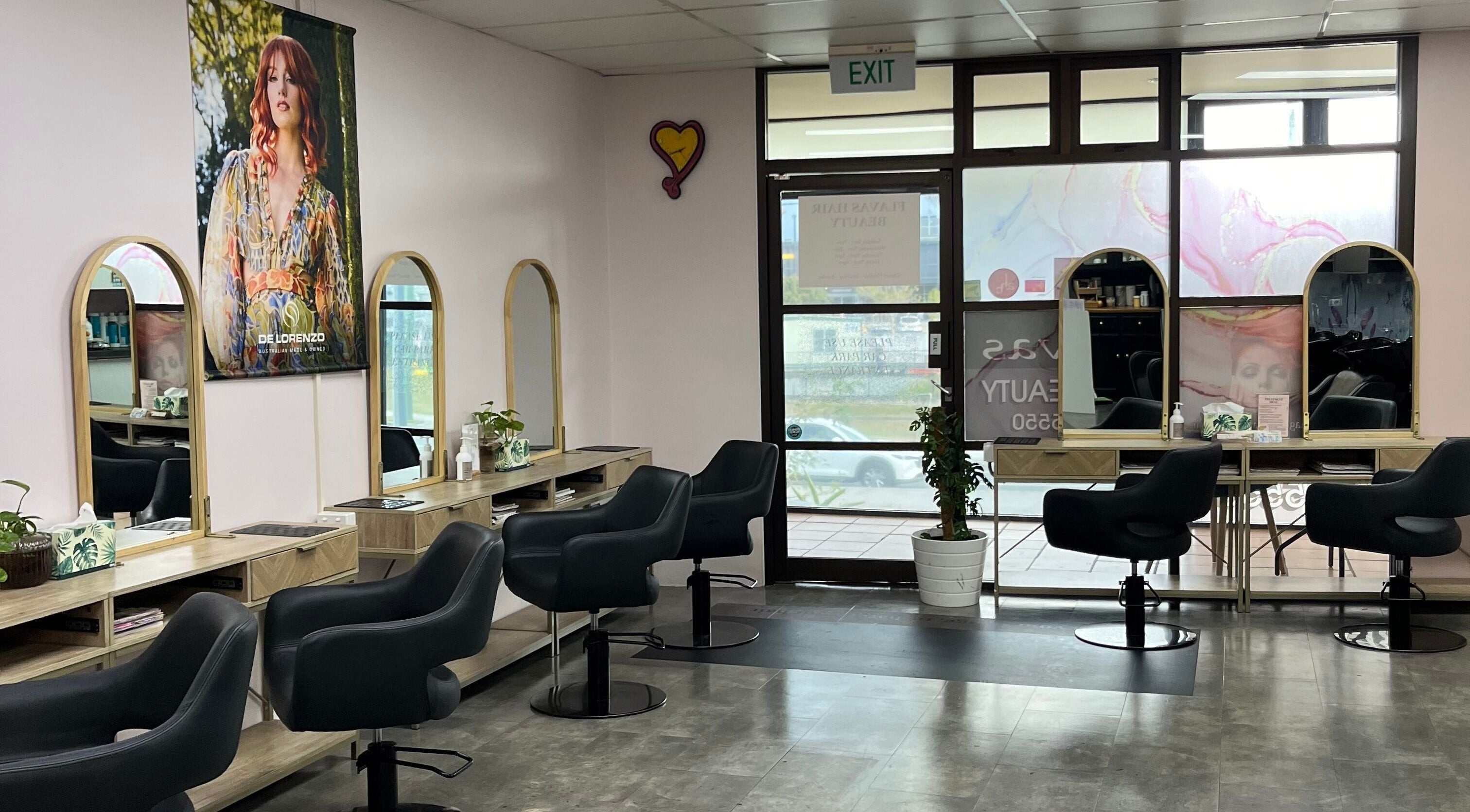 Interior of Flavas Hair Beauty salon, elegant mirrors and chairs, Everton Park, Queensland, AU.
