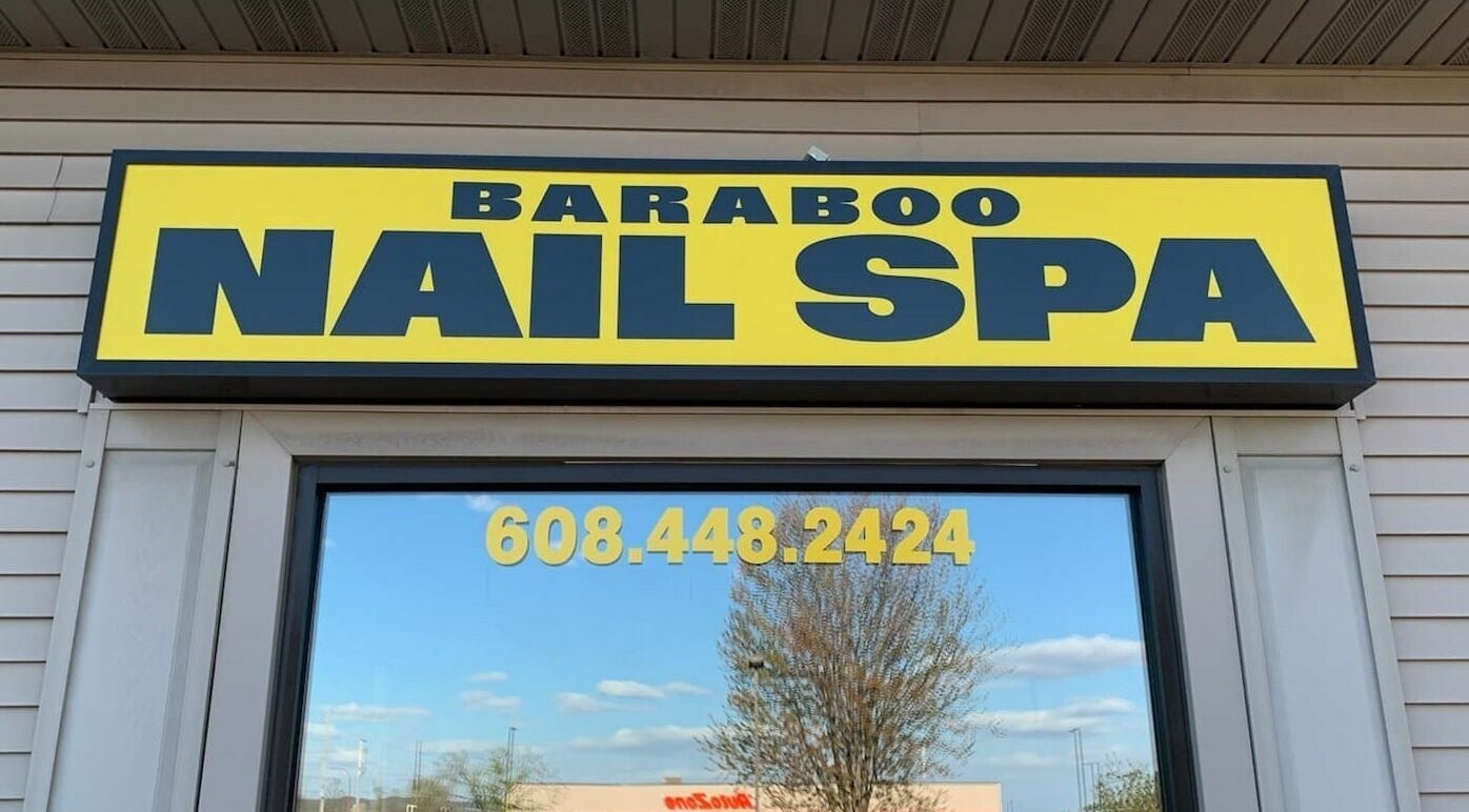 Front entrance sign of Baraboo Nail Spa in Baraboo, Wisconsin, US, showcasing the business name prominently.