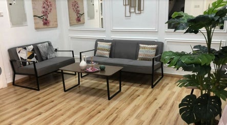 Spacious lounge at Al-Fal Beauty Center | Abu-Dhabi with plush seating, decor, and plants, أبو ظبي, أبو ظبي, AE.