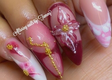 Elegant floral nail design at Alluring Nails by Tammy, New Providence, BS, showcasing intricate artistry.