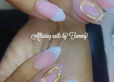 Elegant nail art with gold accents at Alluring Nails by Tammy, New Providence, BS.