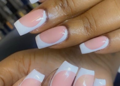 French manicure at Alluring Nails by Tammy in New Providence, BS, showcasing elegant nail art.