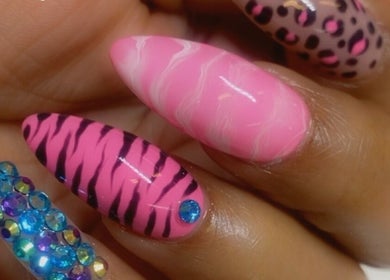 Colorful gel nails with rhinestones at Alluring Nails by Tammy, New Providence, BS.