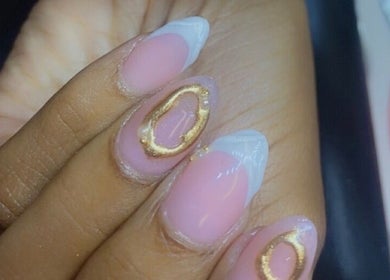 Elegant pink and gold nail art at Alluring Nails by Tammy in New Providence, BS showcasing creativity.