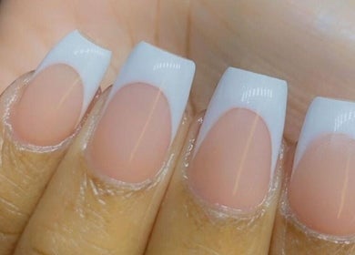 French manicure at Alluring Nails by Tammy in New Providence, BS, showcasing elegant white tips.