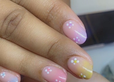Floral pastel nail art at Alluring Nails by Tammy in New Providence, BS, showcasing intricate flower designs.