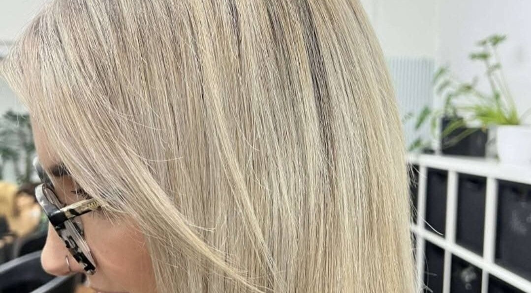 Sleek blonde hairstyle at Lincoln Hair Shack in Port Lincoln, South Australia, AU.