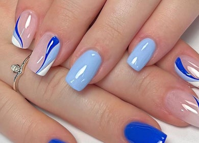 Nail art by Kate Matthews Master Nail Artist, showcasing blue tones in Weymouth, England, GB.