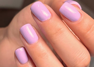 Lilac polished nails by Kate Matthews Master Nail Artist in Weymouth, England, GB, showcasing expert design.