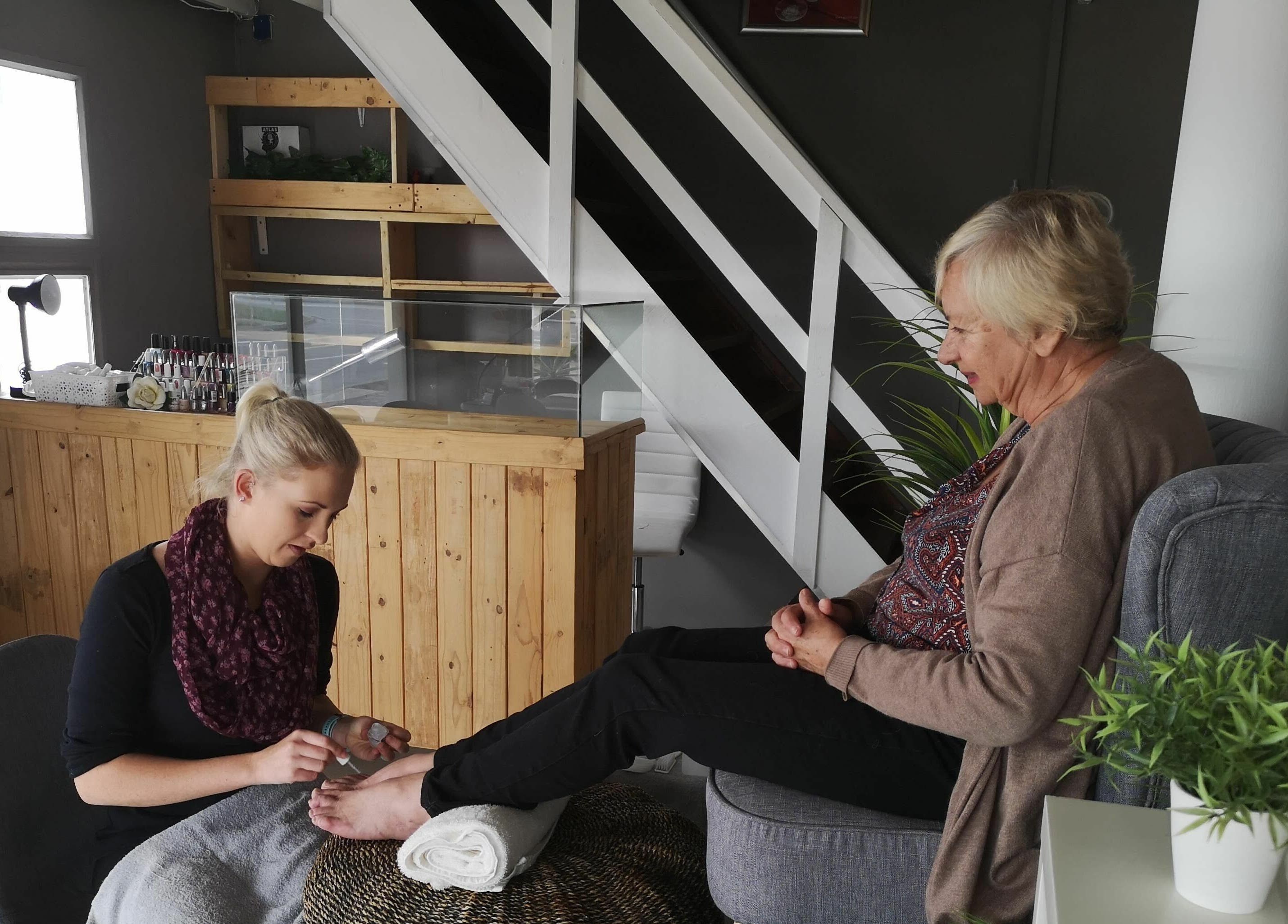 A relaxing pedicure at Beauty Bar in Port Elizabeth, Eastern Cape, ZA with natural decor.