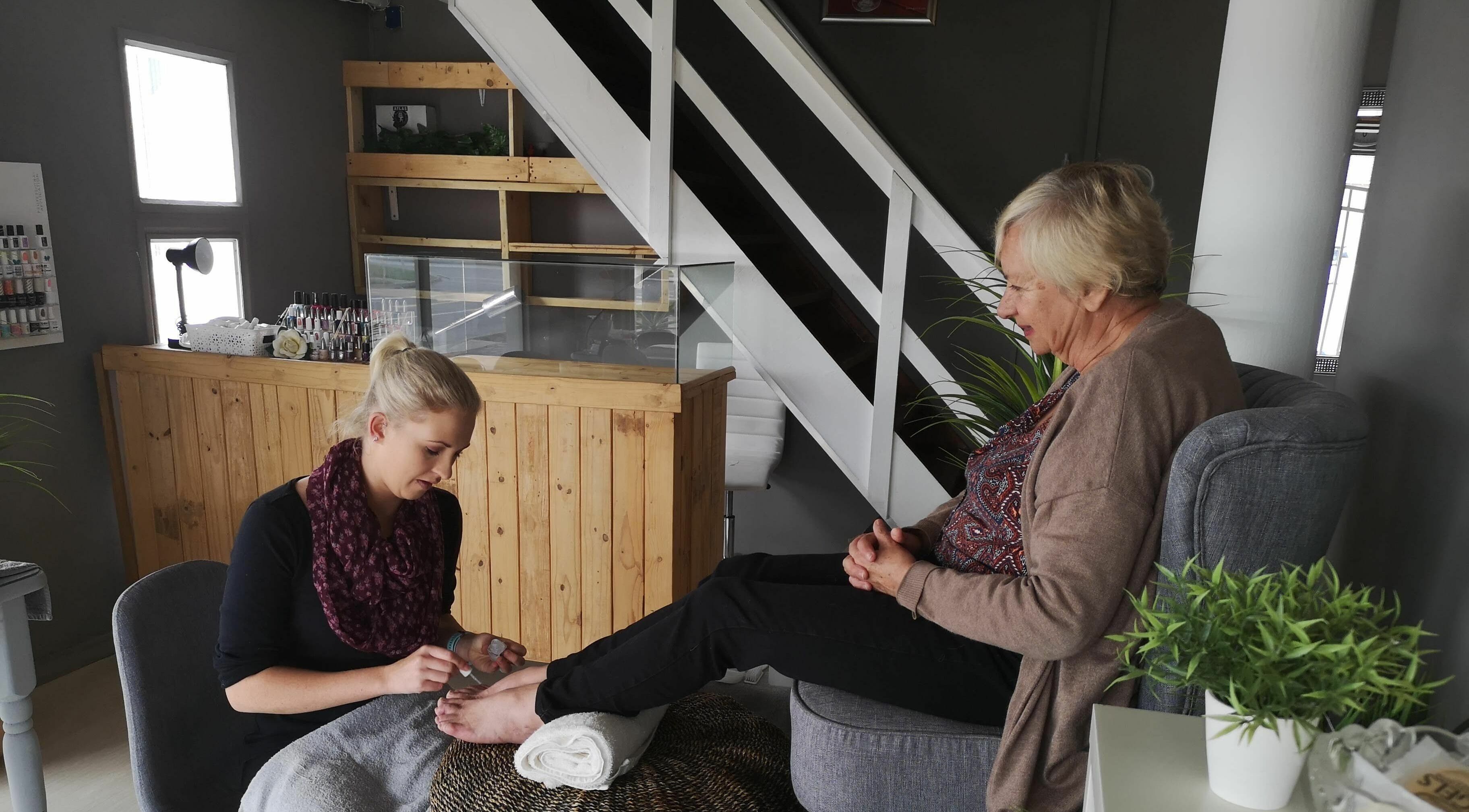 A relaxing pedicure at Beauty Bar in Port Elizabeth, Eastern Cape, ZA with natural decor.