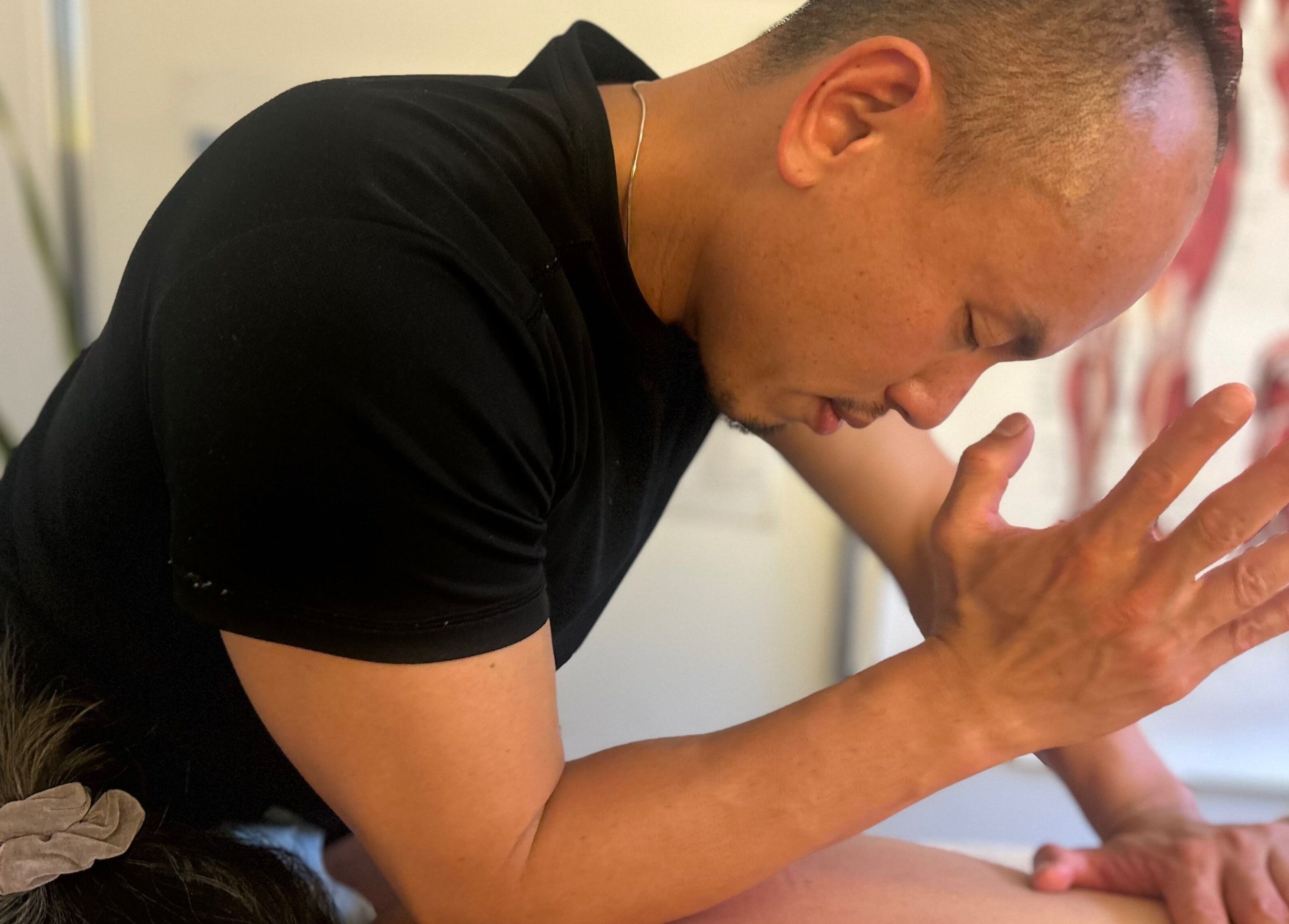 Massage therapist at Move With Jase, Dianella, Western Australia, AU, provides relaxing body therapy.