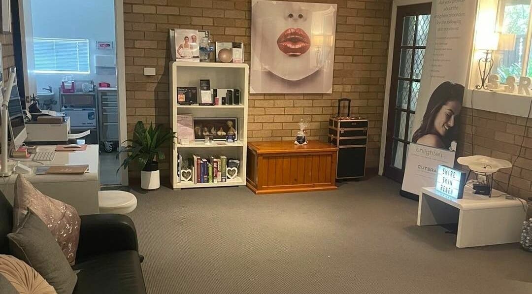 Interior of Shire Skin Renew, Miranda, New South Wales, AU, featuring a cozy lounge area with decor and skincare products.