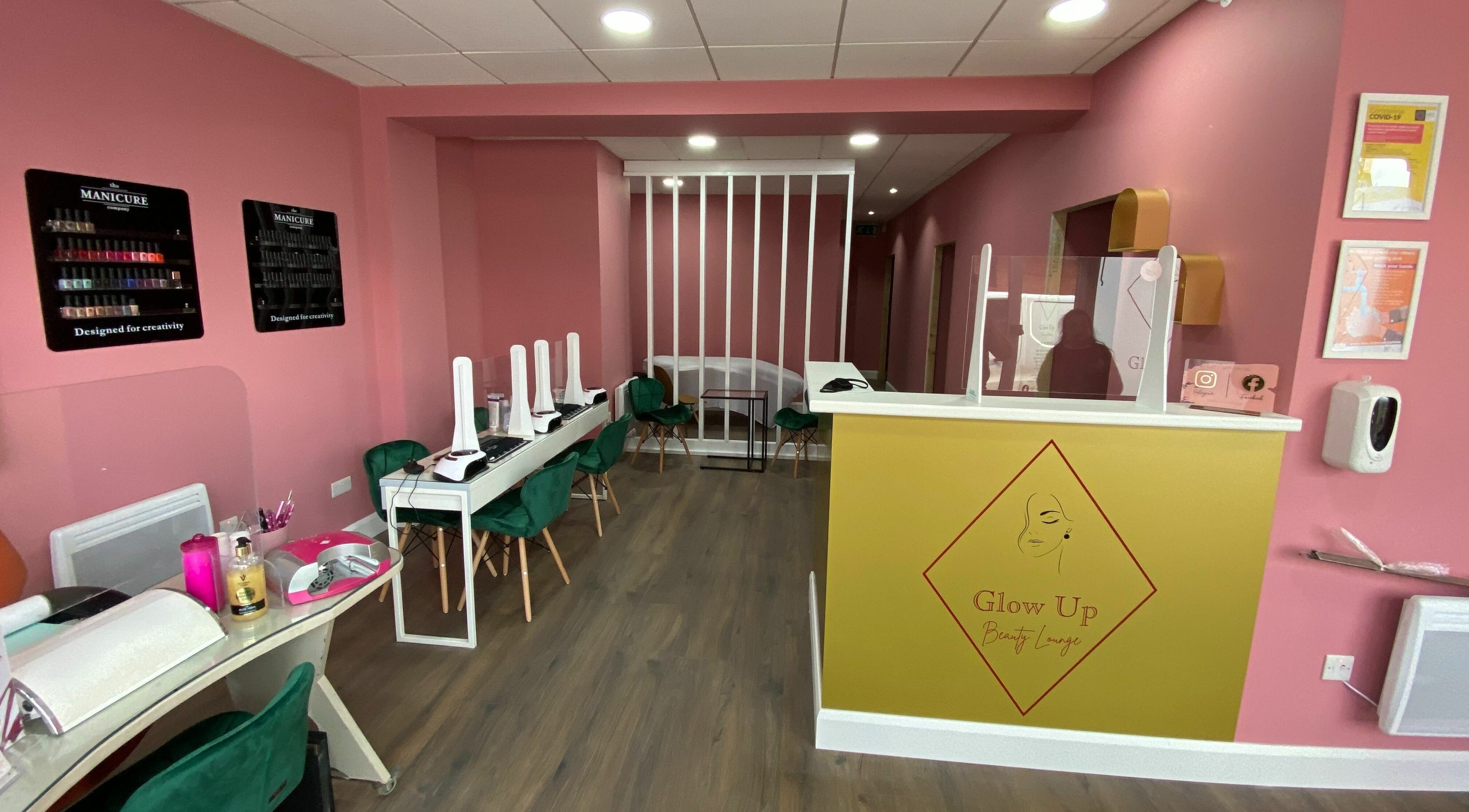 Stylish interior of Glow Up Beauty Lounge in Bray, County Wicklow, IE, featuring modern design with manicure stations.