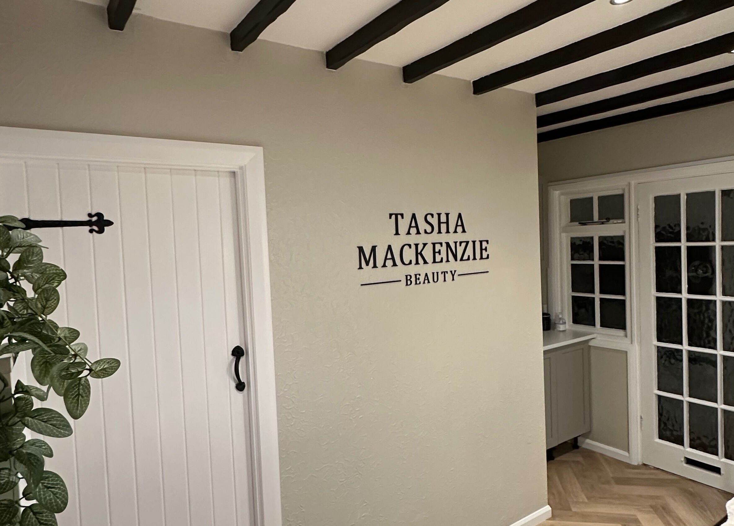 Entrance of Tasha Mackenzie - BEAUTY in Conwy, Wales, GB featuring chic decor and stylish vibes.