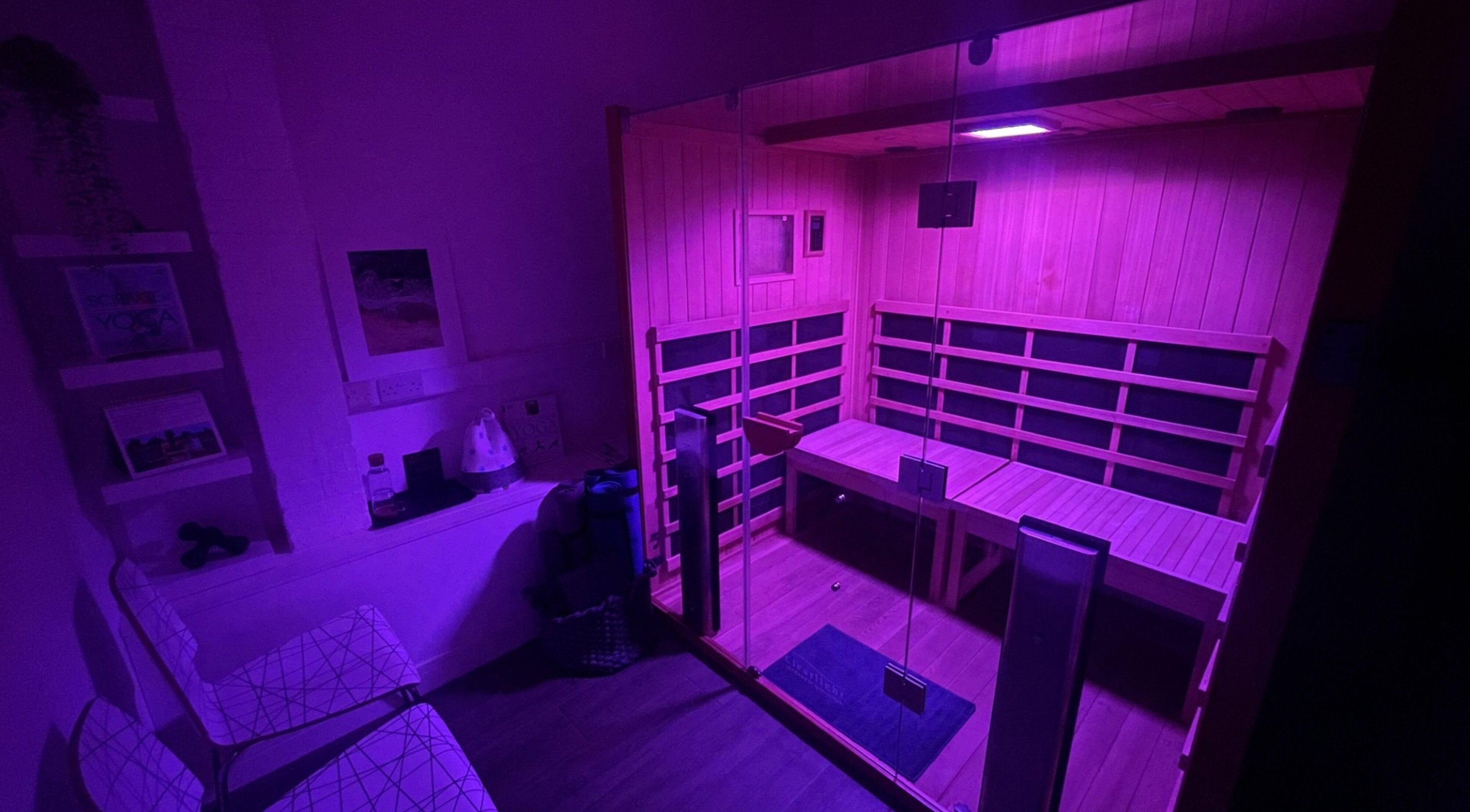 Luxurious purple-lit sauna at Mederi Wellness, Garsington, England, GB for relaxation and rejuvenation.