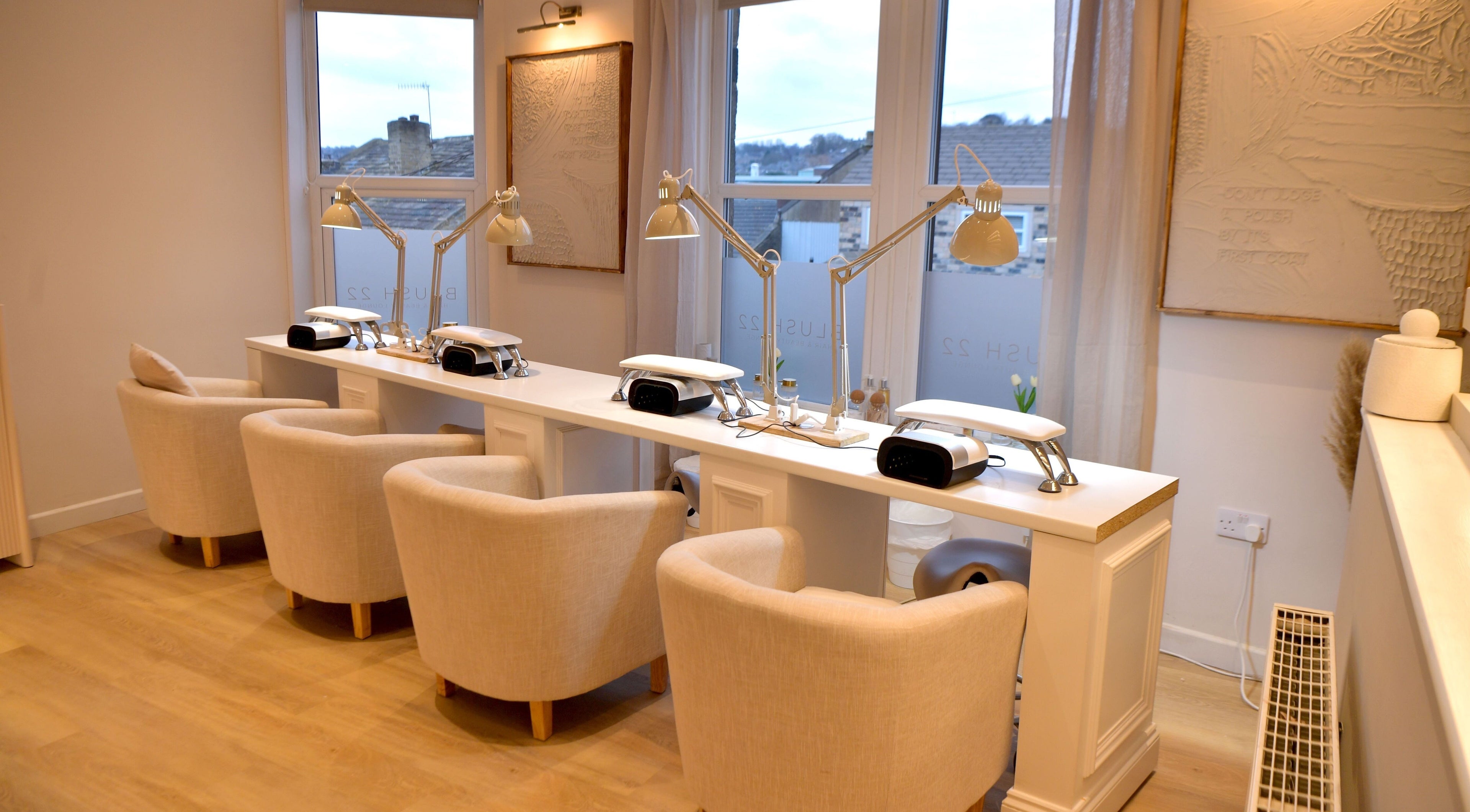 Elegant nail care station at Blush 22 Hair and Beauty Lounge, Bradford, England, GB. Bright, serene interior.