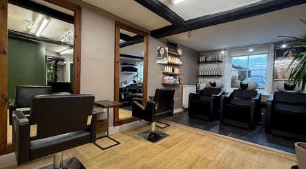 Let Lew Hair Design - Evesham showcases modern salon chairs and cozy ambiance in Evesham, England, GB.