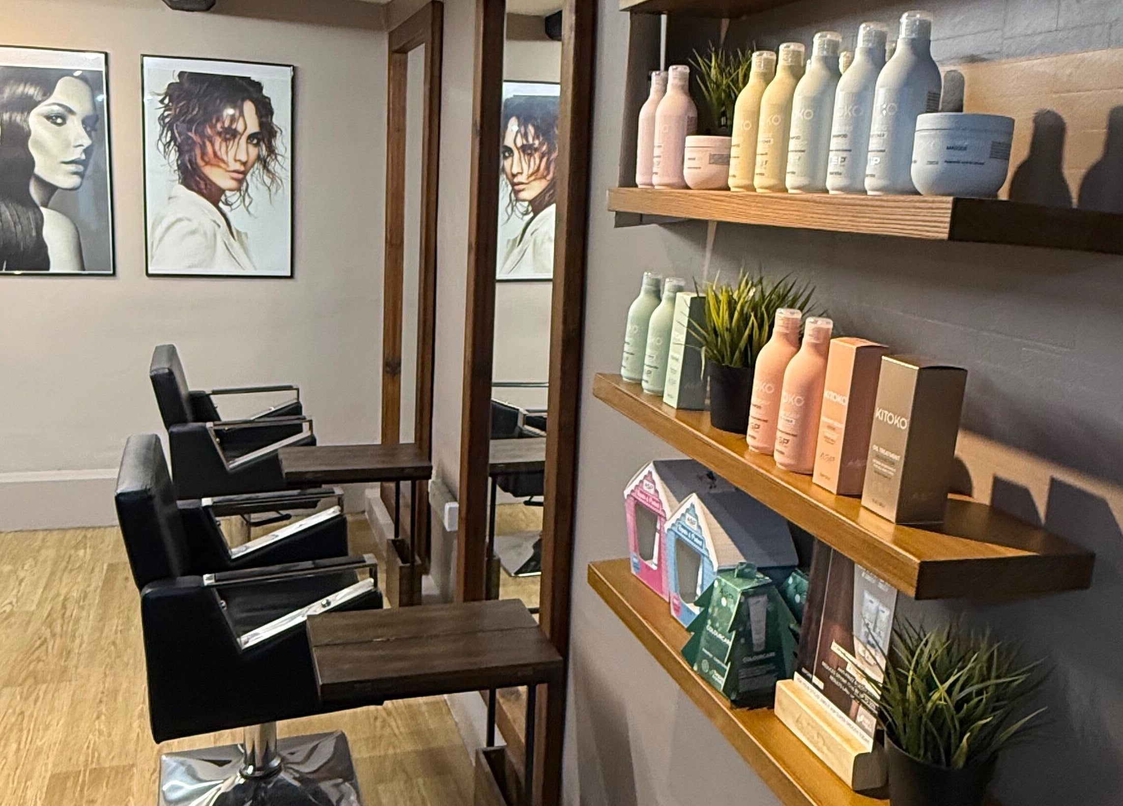 Interior of Let Lew Hair Design - Evesham, showcasing styling chairs and product shelves in Evesham, England, GB.
