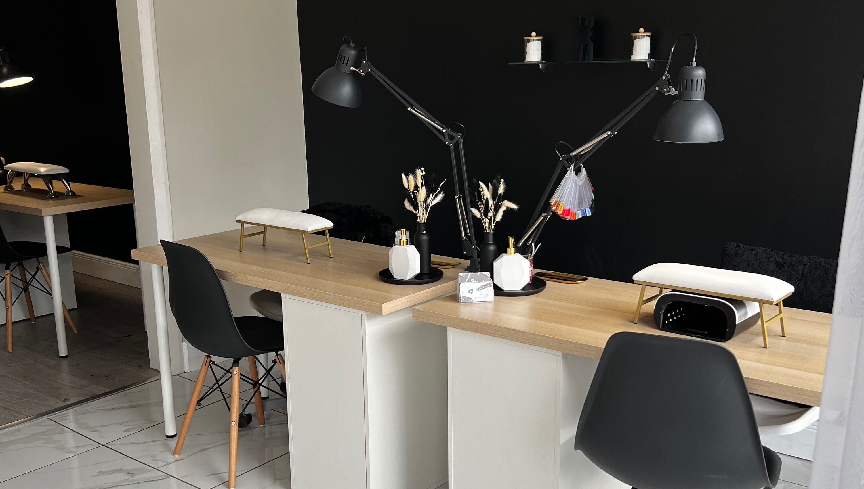 Modern nail station at Studio Glow, Huddersfield, England, GB, featuring sleek decor and professional tools.