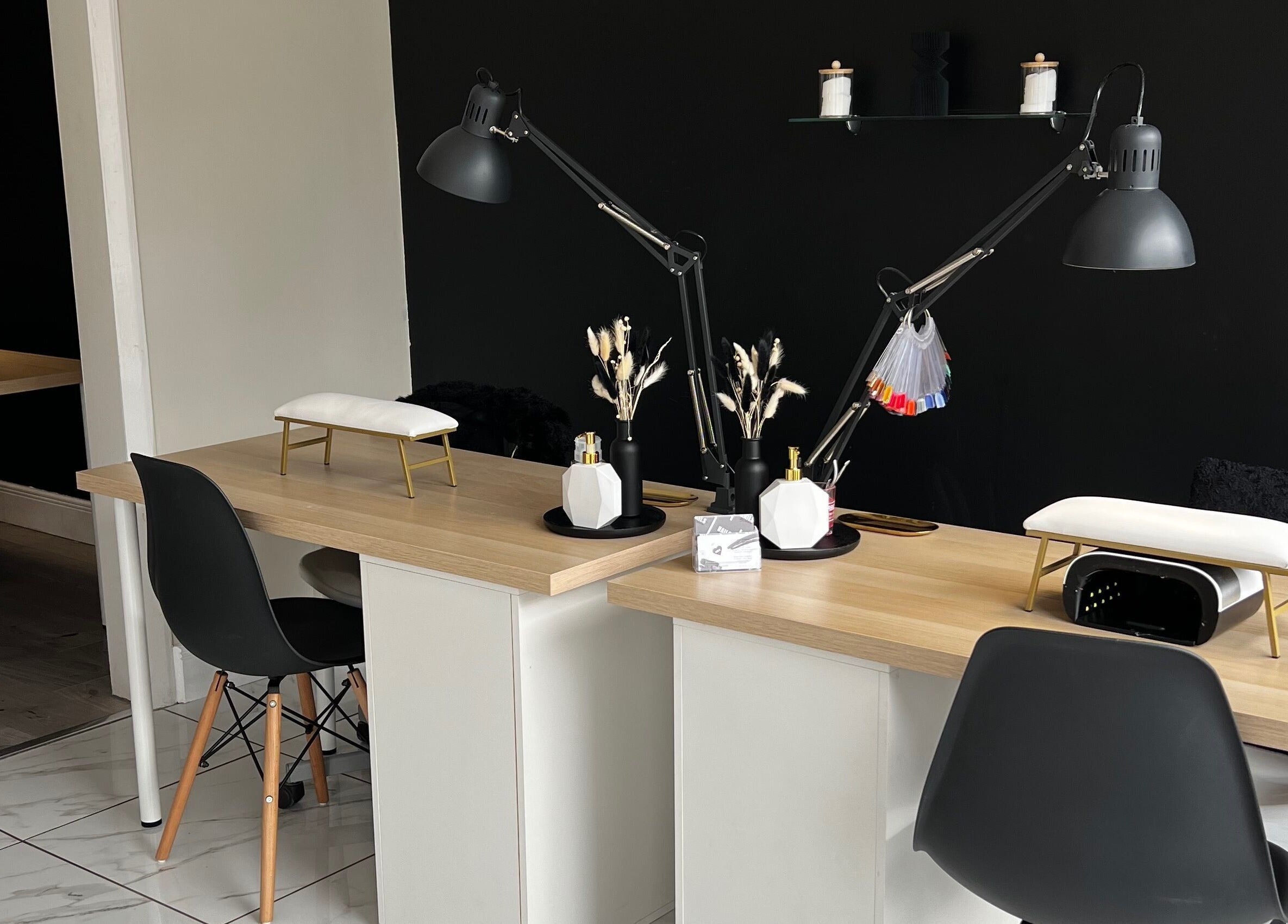 Modern nail station at Studio Glow, Huddersfield, England, GB, featuring sleek decor and professional tools.