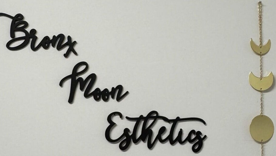 Bronx Moon Esthetics sign with moon phases decoration in Bronx, New York, US.