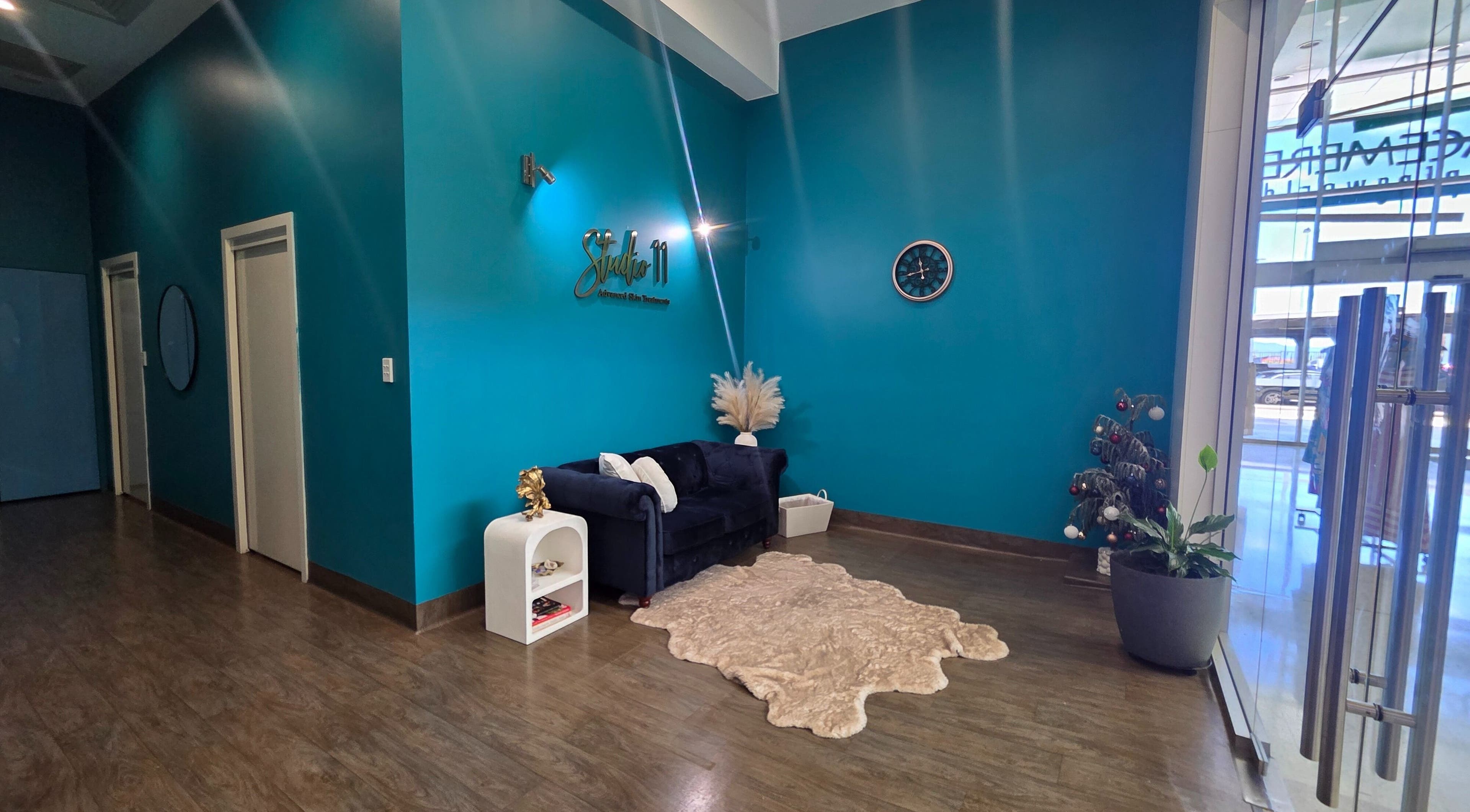 Chic interior of Studio 11 Advanced Skin Treatments in Gracemere, Queensland, AU with plush seating.