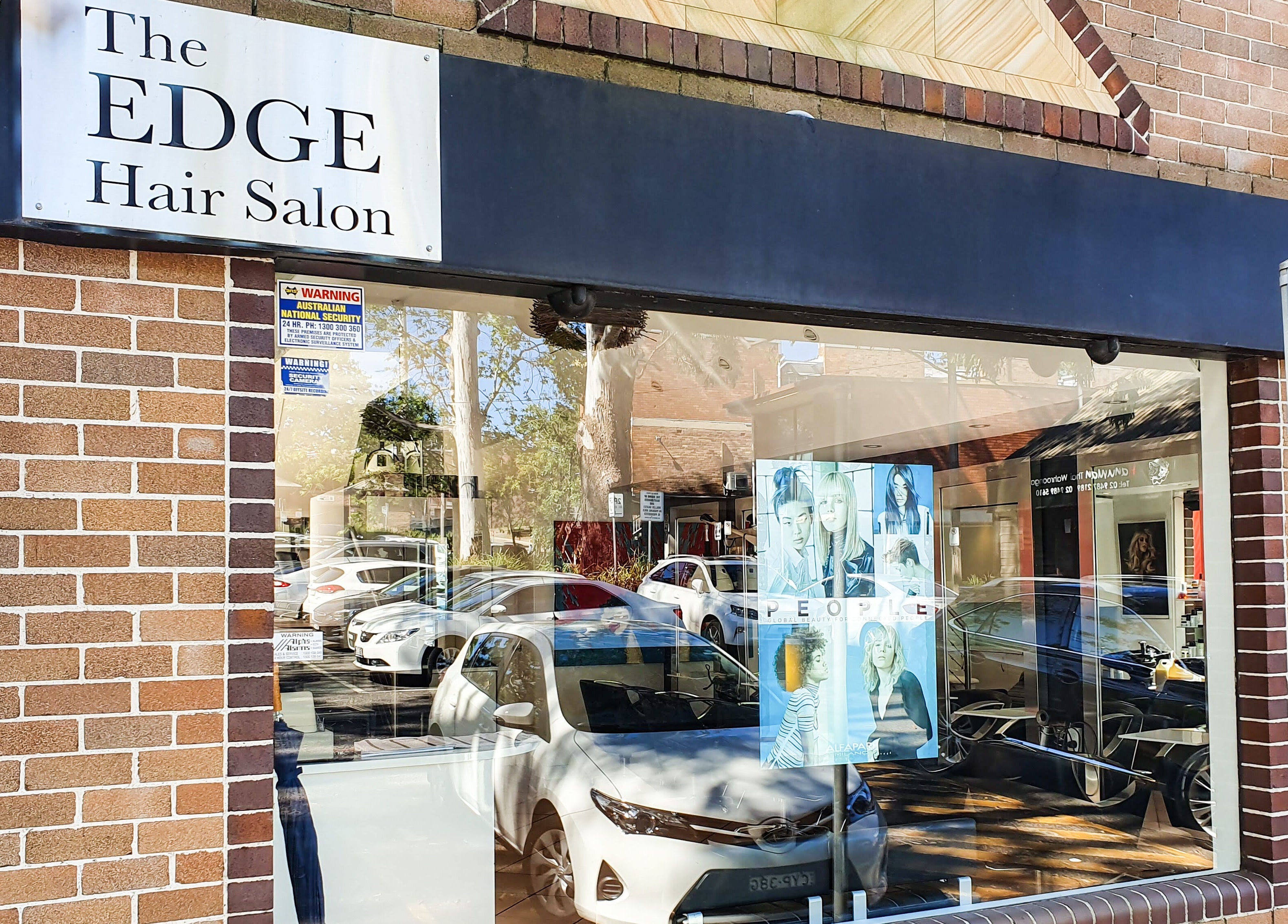 Street view of The Edge Hair Salon, Wahroonga, New South Wales with stylish brick exterior.