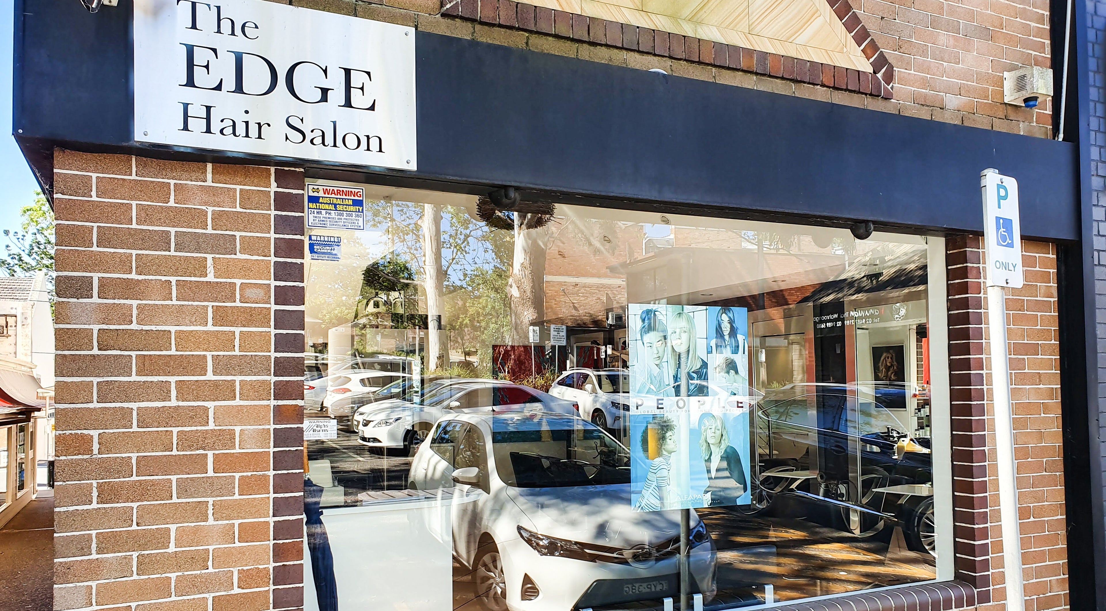Street view of The Edge Hair Salon, Wahroonga, New South Wales with stylish brick exterior.