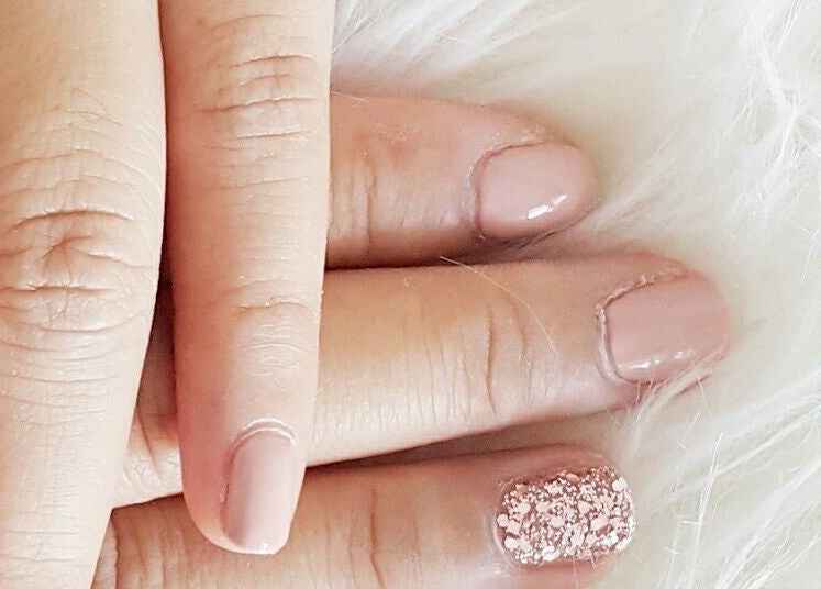 Elegant pink glitter nails at Avante Studio Galaxy, West Java, West Java, ID. Perfect manicure for a polished look.