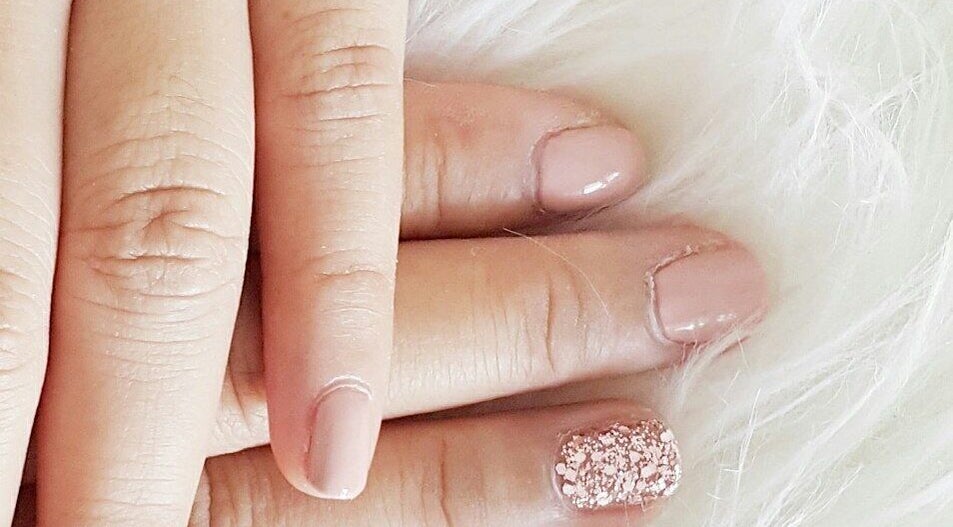 Elegant pink glitter nails at Avante Studio Galaxy, West Java, West Java, ID. Perfect manicure for a polished look.