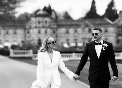 Stylish couple in formal wear outside. Venue: Steph Skelton Hair Studio, York, England, GB.