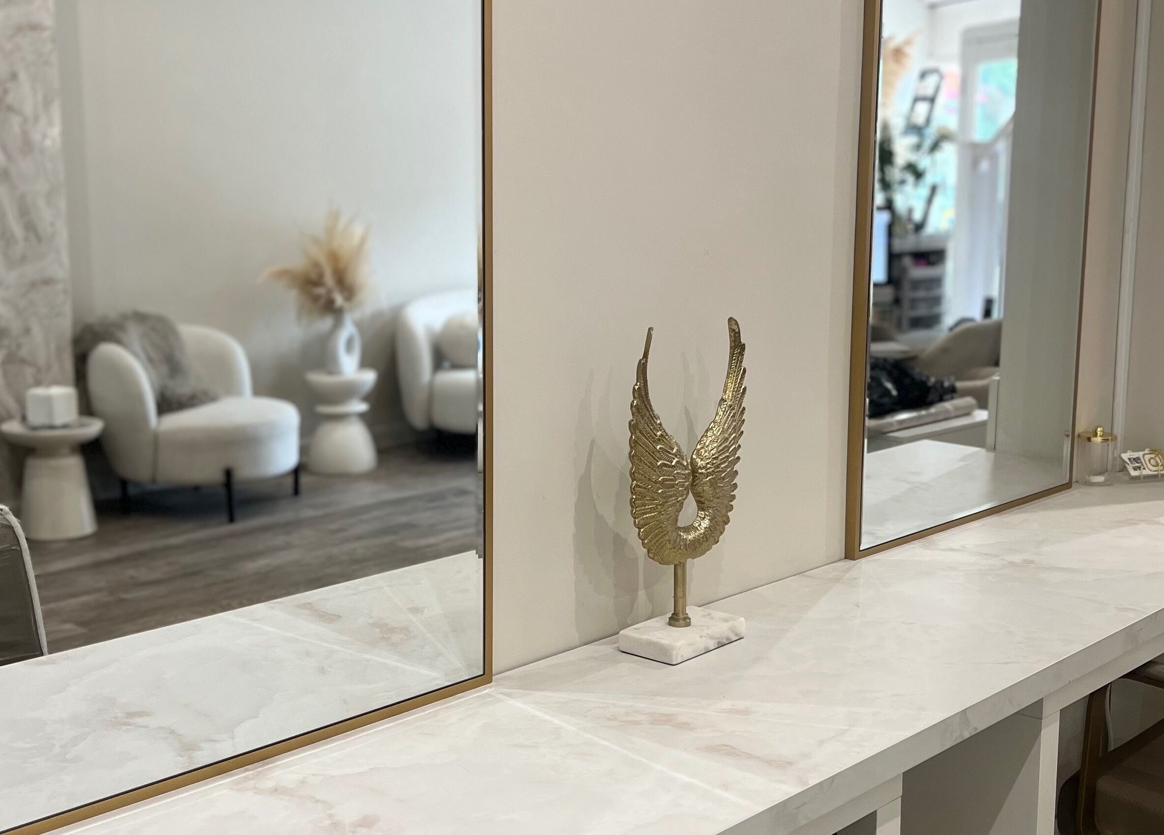 Elegant interior of The Hair Extension Shop, West Wickham, England, GB, showcasing stylish decor and seating.