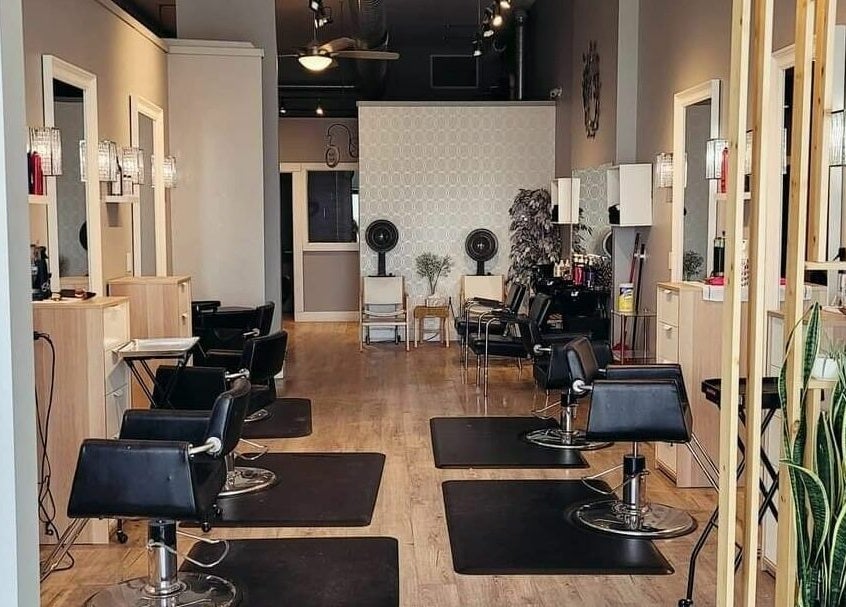 Interior of Hot Shades Salon, Pilot Butte, Saskatchewan, CA with stylish decor and salon chairs.