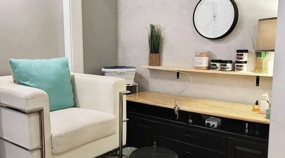 Inviting salon chair at Hot Shades Salon, Pilot Butte, Saskatchewan, CA, with elegant decor and soothing ambiance.