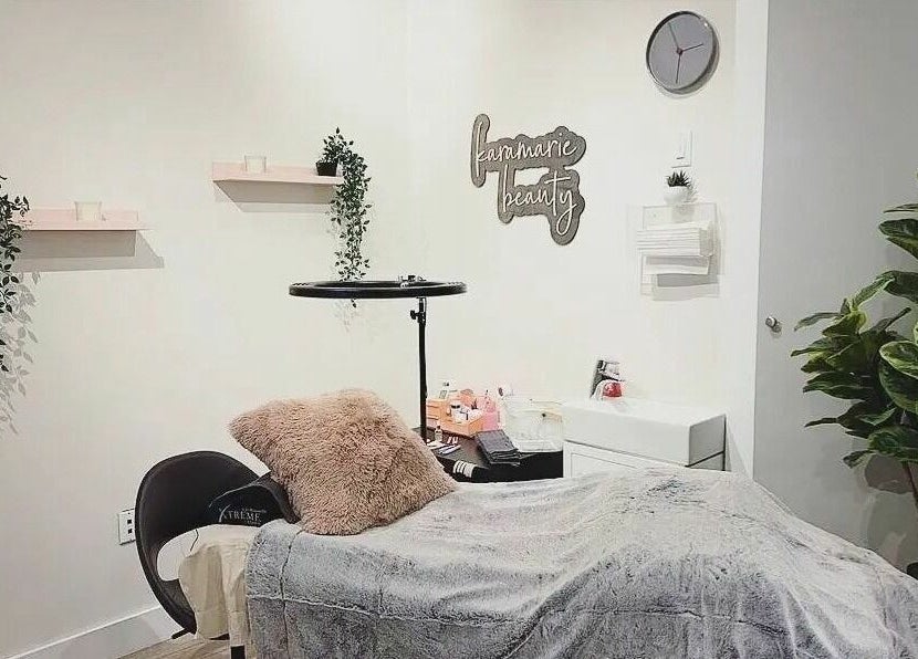 Cozy treatment room at Hot Shades Salon, Pilot Butte, Saskatchewan, CA with lush greenery and plush decor.
