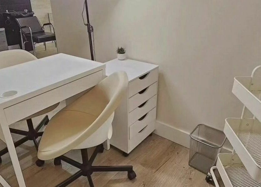 Minimalist white nail station at Hot Shades Salon, Pilot Butte, Saskatchewan, CA.