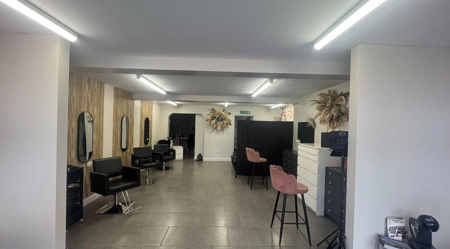 Stylish interior of Curly Sue’s Hair and Beauty in Dungannon, Northern Ireland, GB featuring chic seating and decor.
