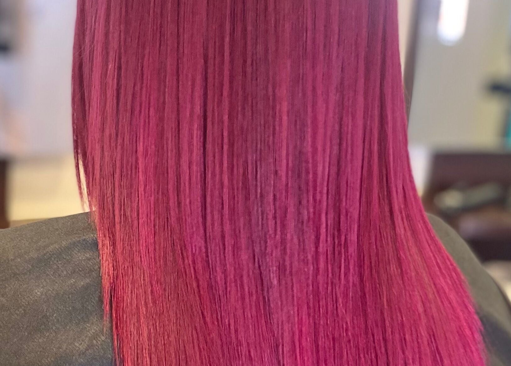 Elegant magenta hair highlighting expertise at hairstyles@wetherells, Selby, England, GB salon.