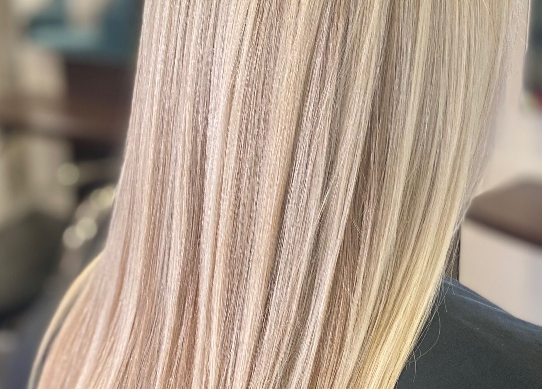 Beautiful straight blonde hair styled at hairstyles@wetherells in Selby, England, GB.